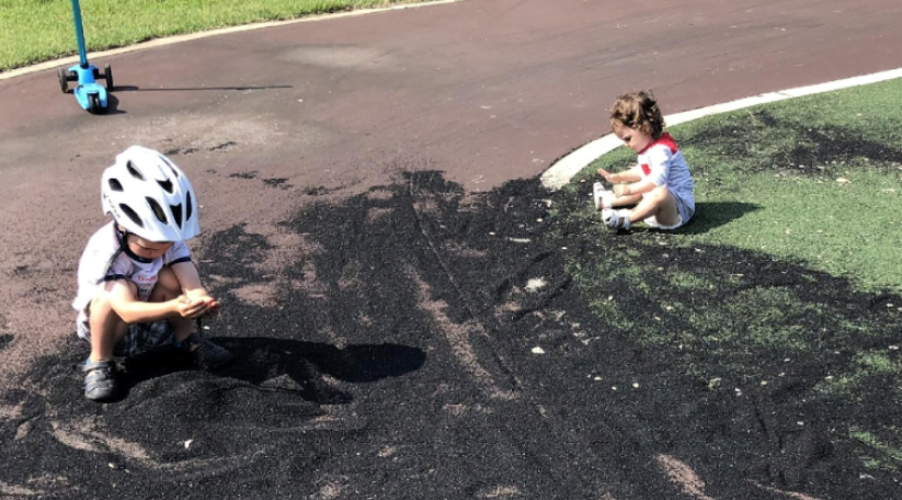 Children playing with turf | National Center for Health Research